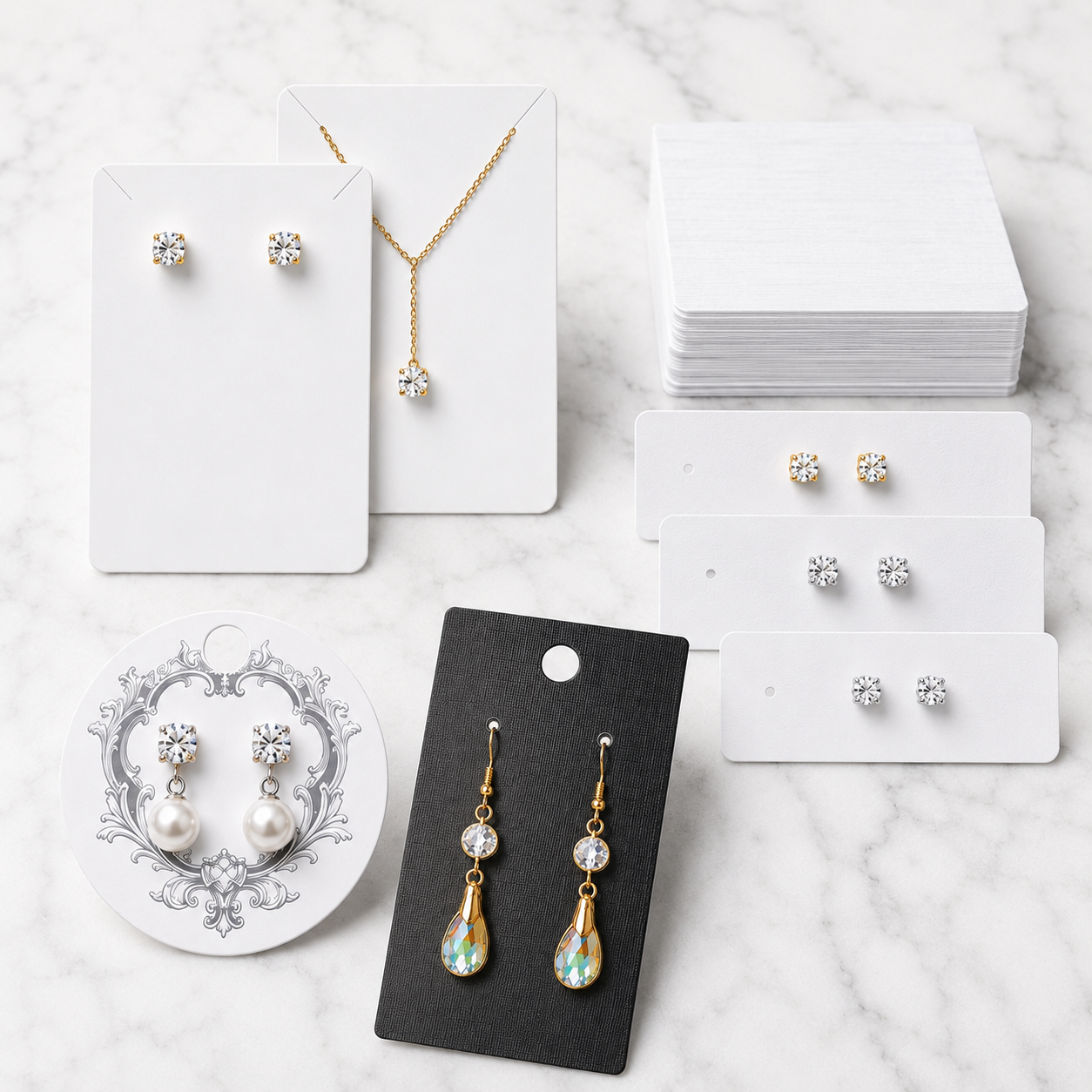 selection of jewellery display cards in brown, white, black and grey  white marble