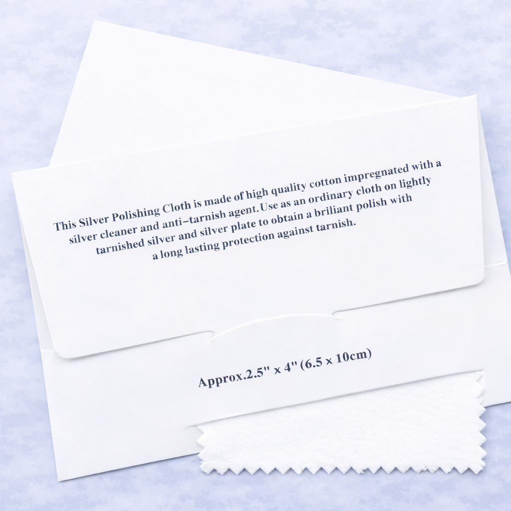 Silver polishing cloth with instructions and dimensions on a light blue background