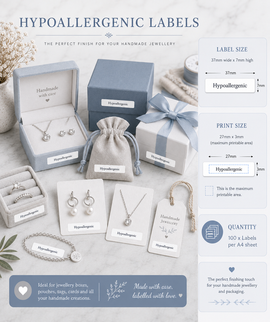 Hypoallergenic labels for handmade jewelry displayed with jewelry packaging and accessories.